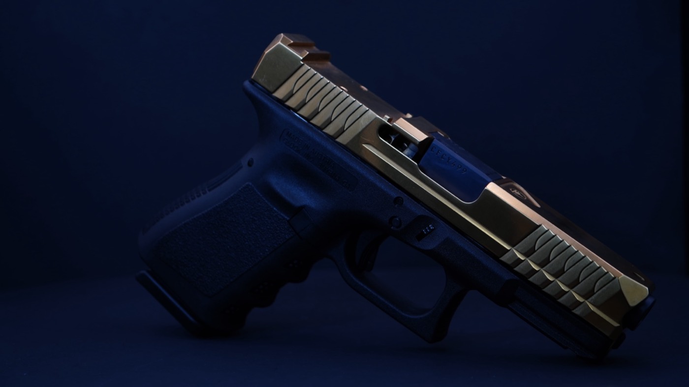 Glock 17 with TiN gold PVD-coated slide